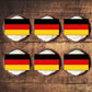 top view of German Flag Edible Cupcake Toppers on chocolate cupcakes with white frosting