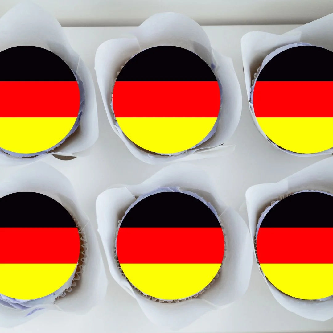 German Flag Round Edible Cupcake Toppers on chocolate cupcakes with white frosting