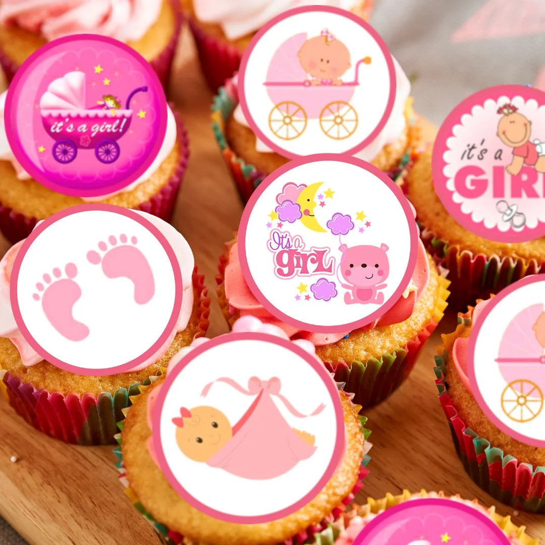 cupcakes with pink frosting topped with It's A Girl pink Baby Shower Edible Cupcake Toppers