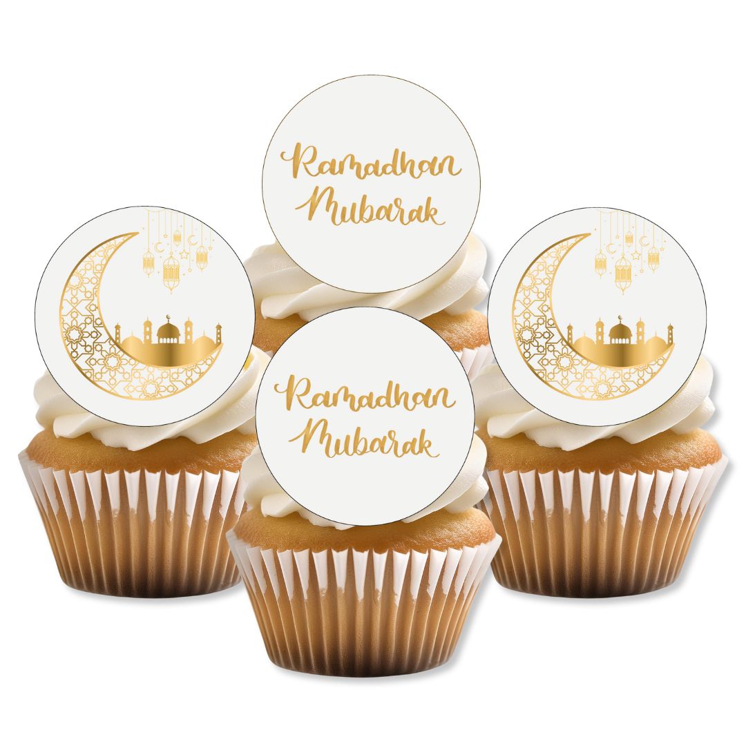 Cupcakes with 'Ramadan Mubarak' toppers on a white background