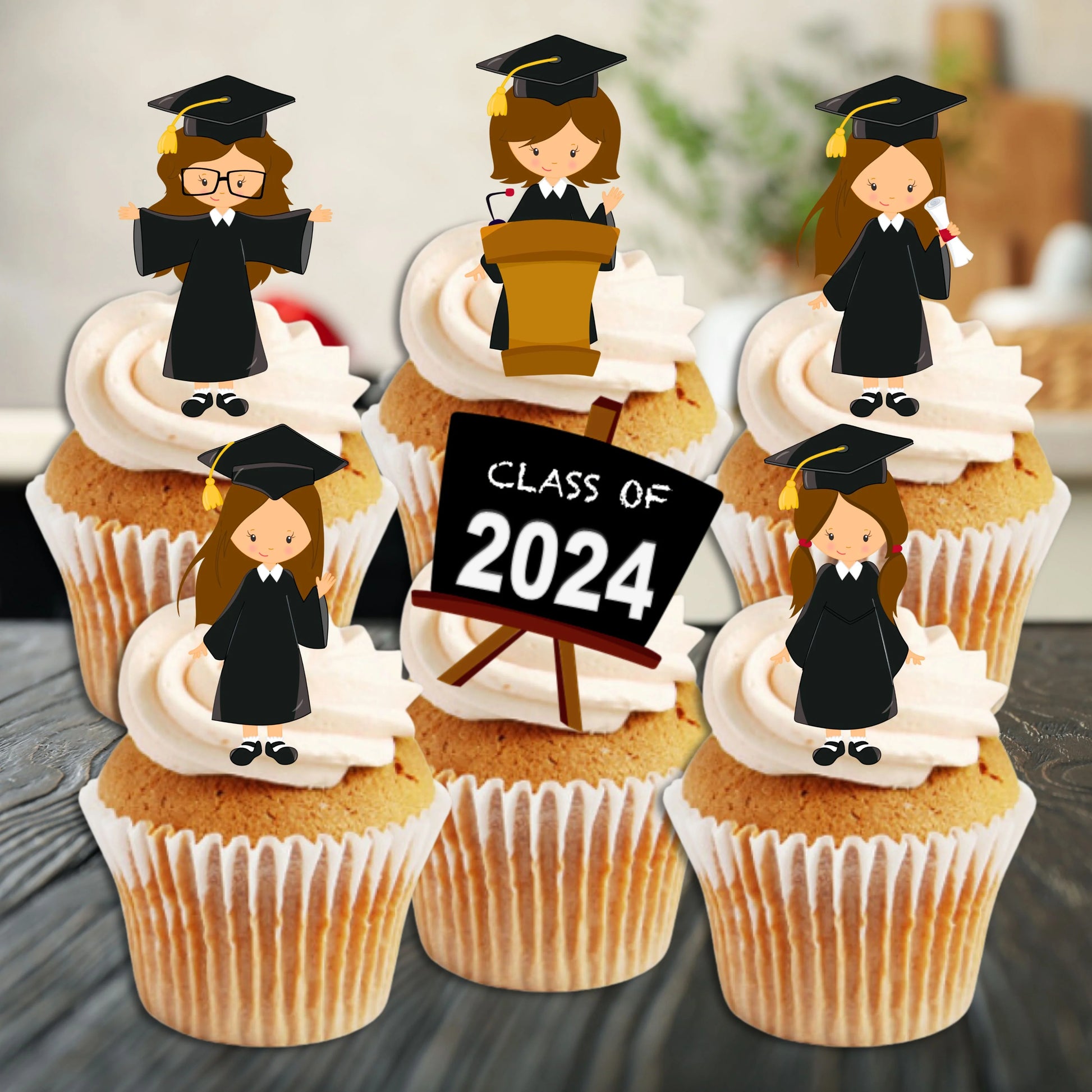 Graduation Girl Edible Cupcake Toppers on white frosted cupcakes 