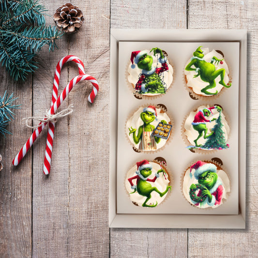 Grinch Theme Edible Cupcake Toppers on white frosted cupcakes 