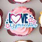 love gymnastics cupcake Topper on a pink frosted cupcake