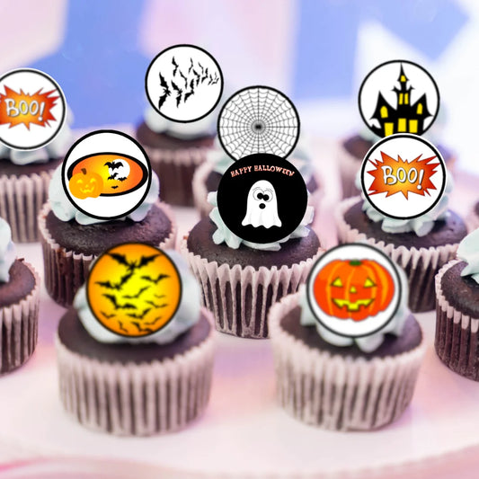 Halloween Edible Cupcake Toppers on chocolate cupcakes with white frosting 