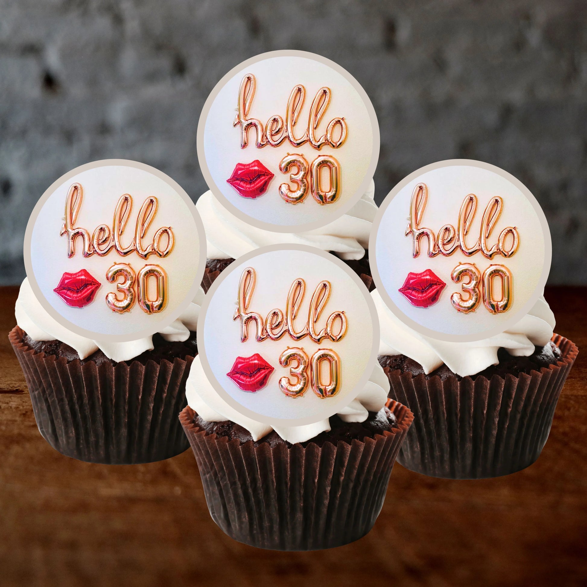 chocolate cupcakes with white frosting and hello 30 cupcake toppers