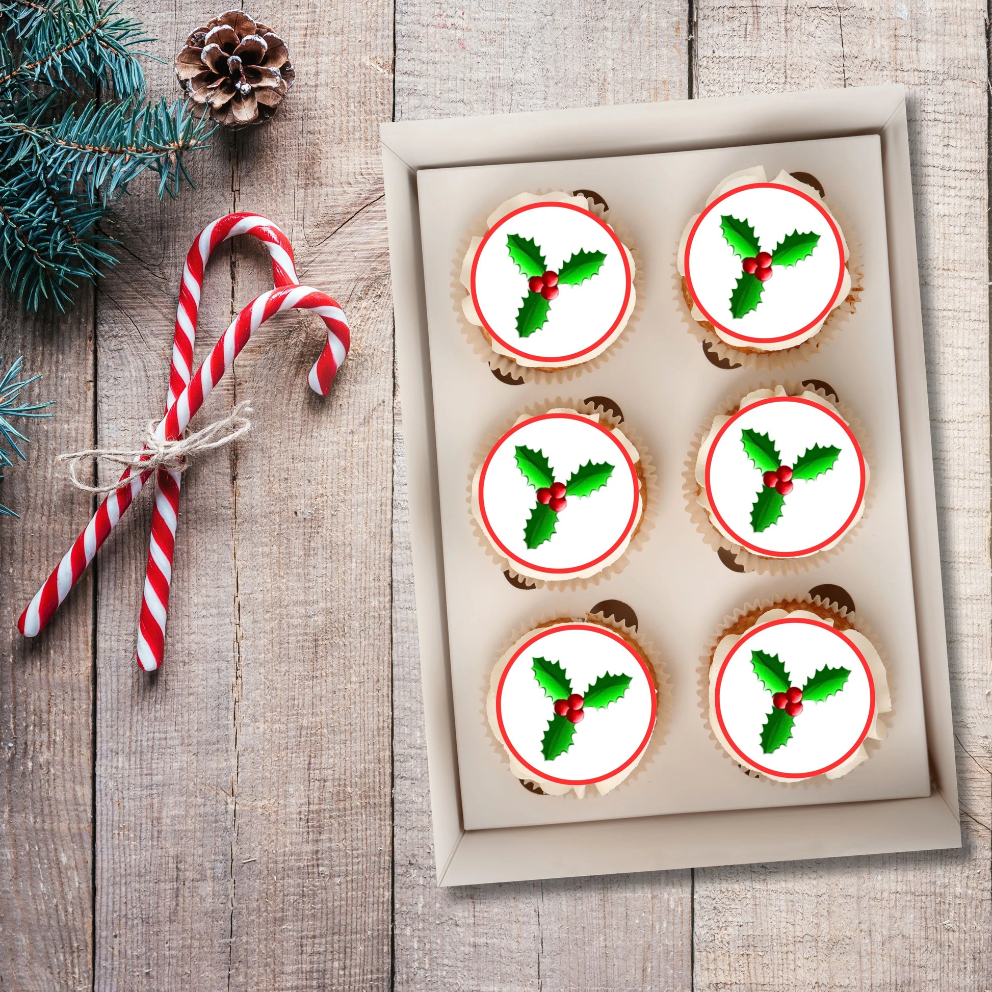 Christmas Holly Edible Cupcake Toppers on chocolate cupcakes with white frosting 