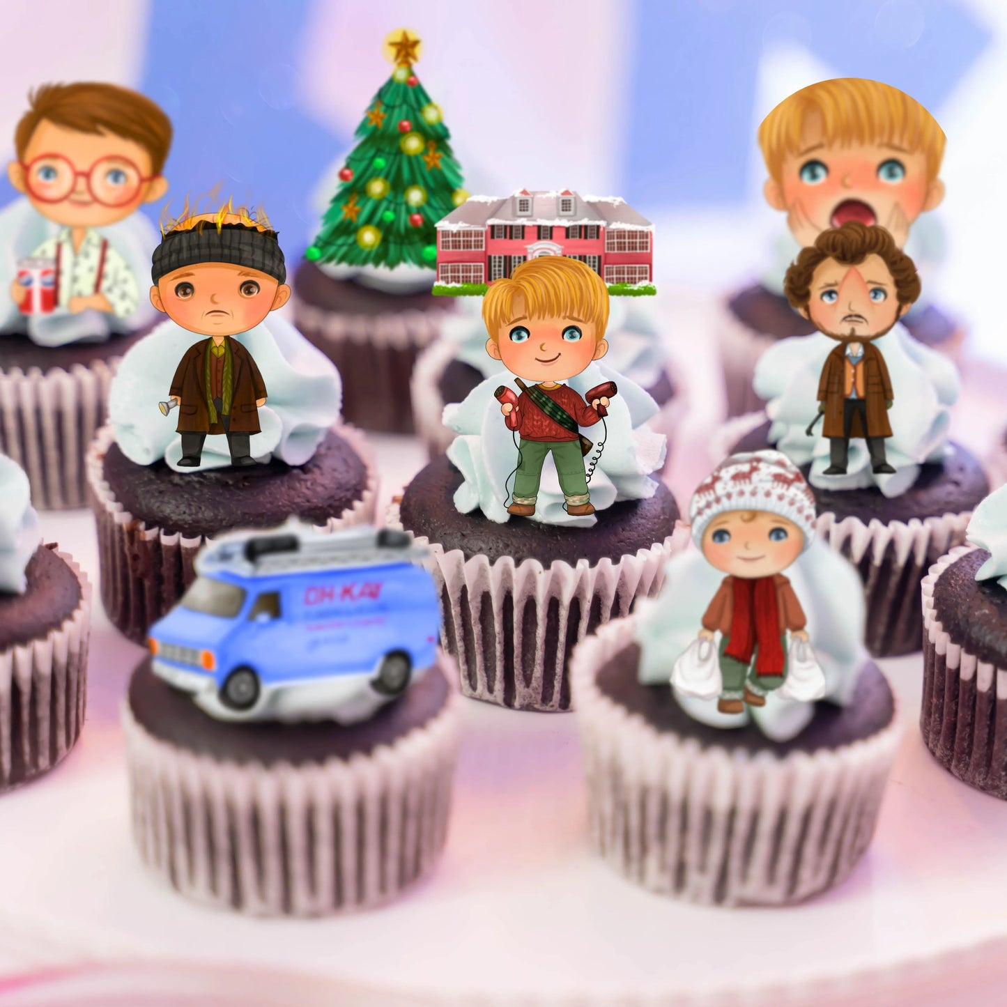 Home Alone Edible Cupcake Toppers on white frosted cupcakes