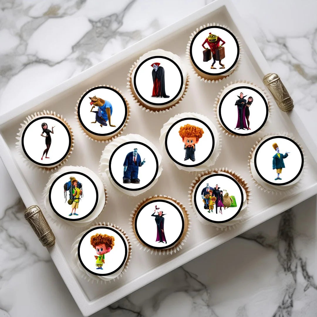 Hotel Transylvania Edible Cupcake Toppers on chocolate cupcakes with white frosting 