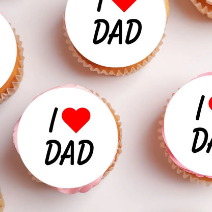 I Love My Dad Father's Day Cupcake Toppers on white frosted cupcakes