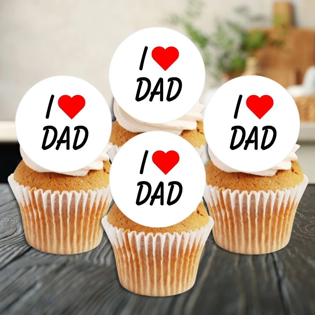 I Love My Dad Father's Day Cupcake Toppers on white frosted cupcakes