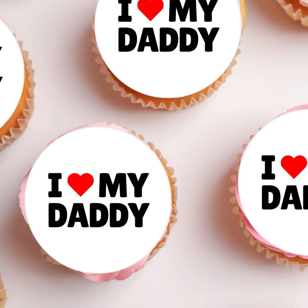 I Love My Daddy Father's Day Cupcake Toppers on white frosted cupcakes