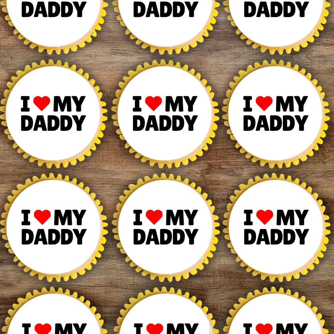 I Love My Daddy Father's Day Cupcake Toppers on white frosted cupcakes