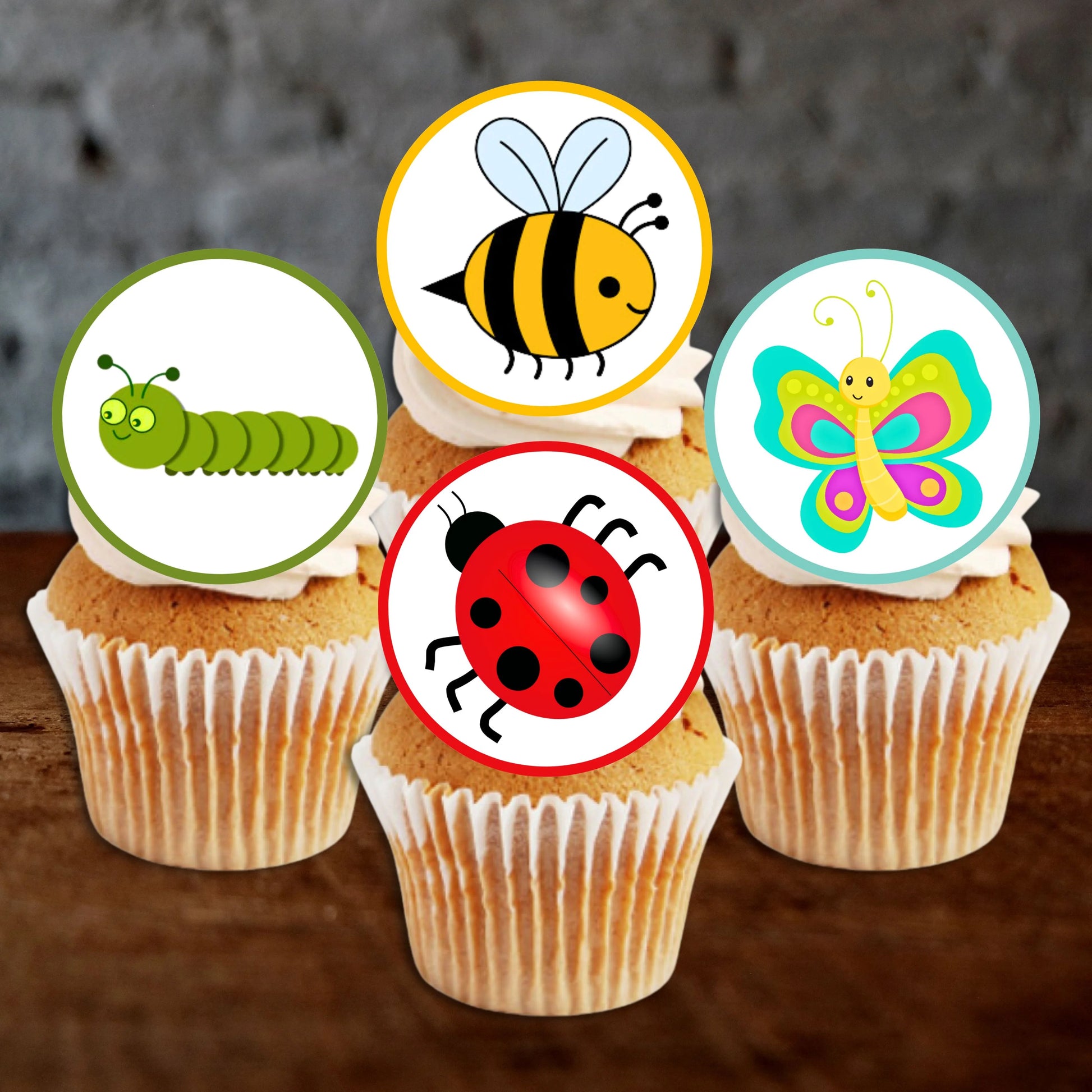 Insects Edible Cupcake Toppers on white frosted cupcakes 