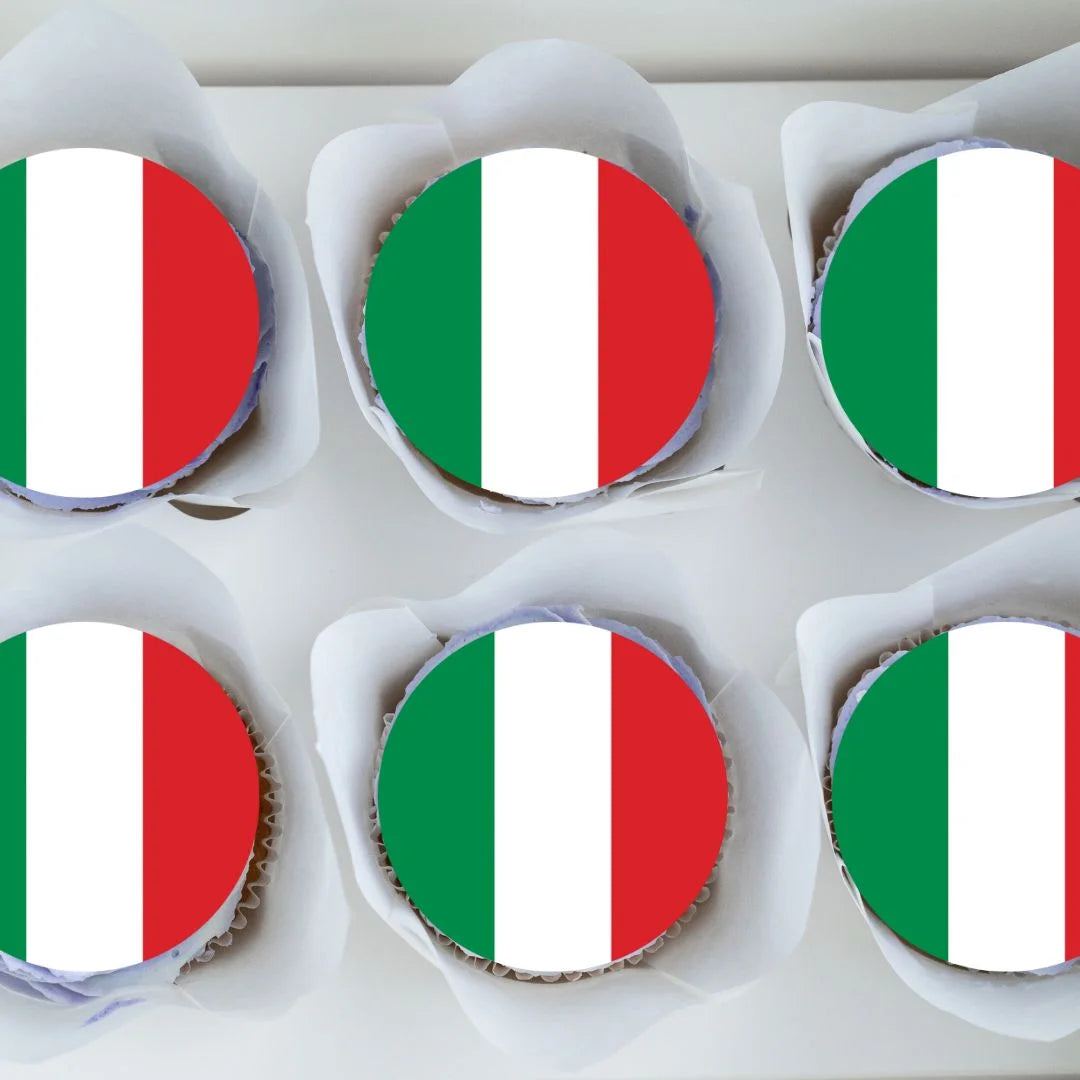 top view of Italian Flag Round Edible Cupcake Toppers on cupcakes with white frosting 