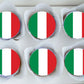 top view of Italian Flag Round Edible Cupcake Toppers on cupcakes with white frosting 