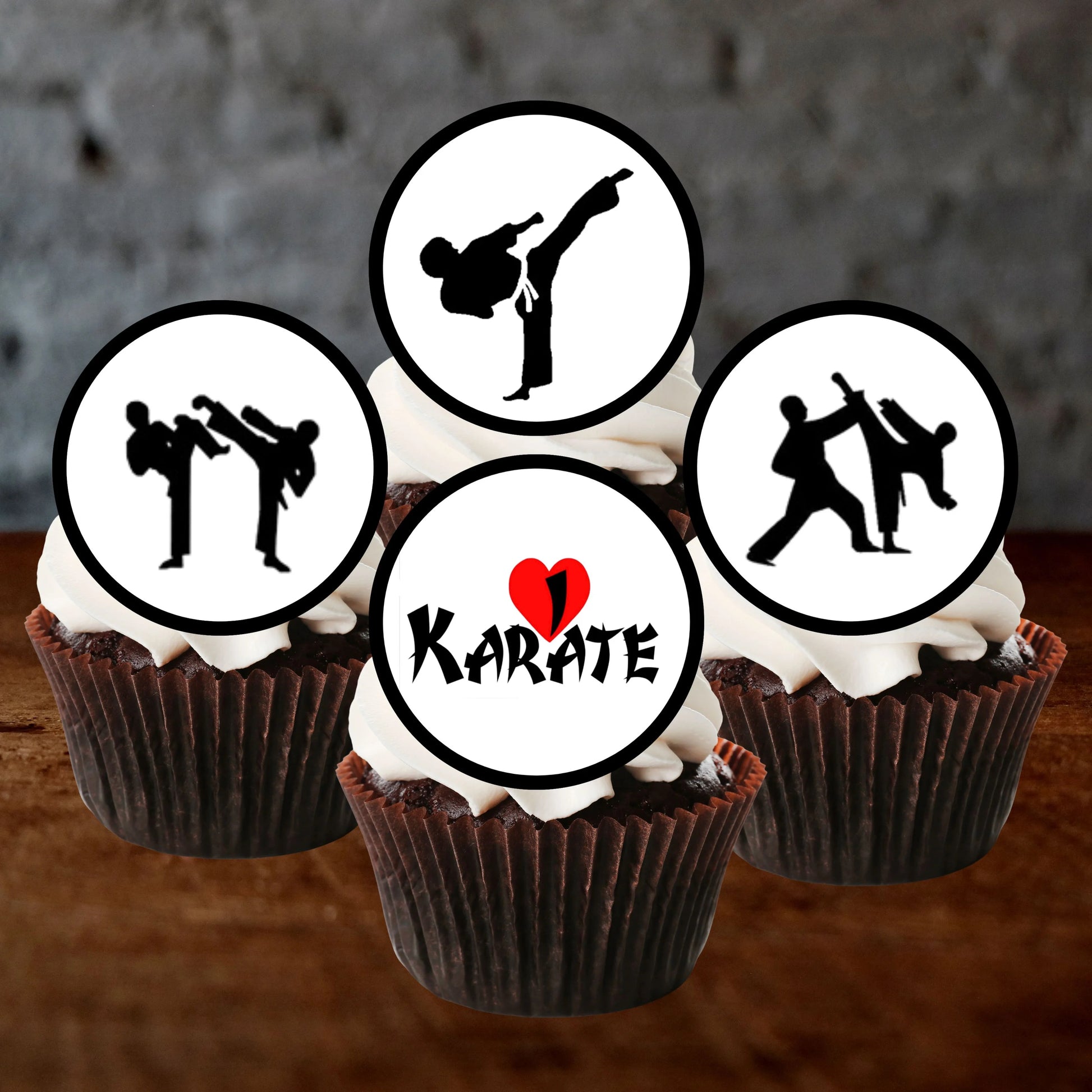 Karate Themed Cupcake Toppers on cupcakes with white frosting