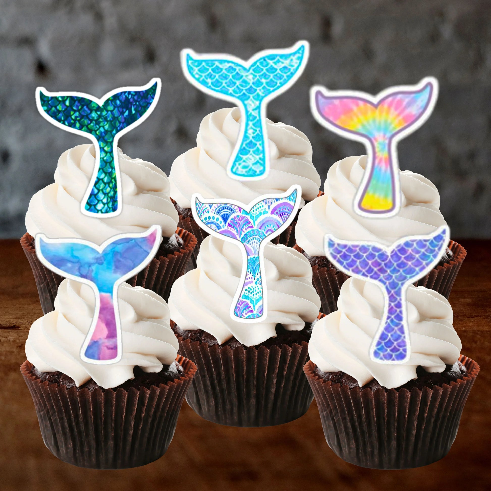 Mermaid Tails Edible Cupcake Toppers on white frosted cupcakes 