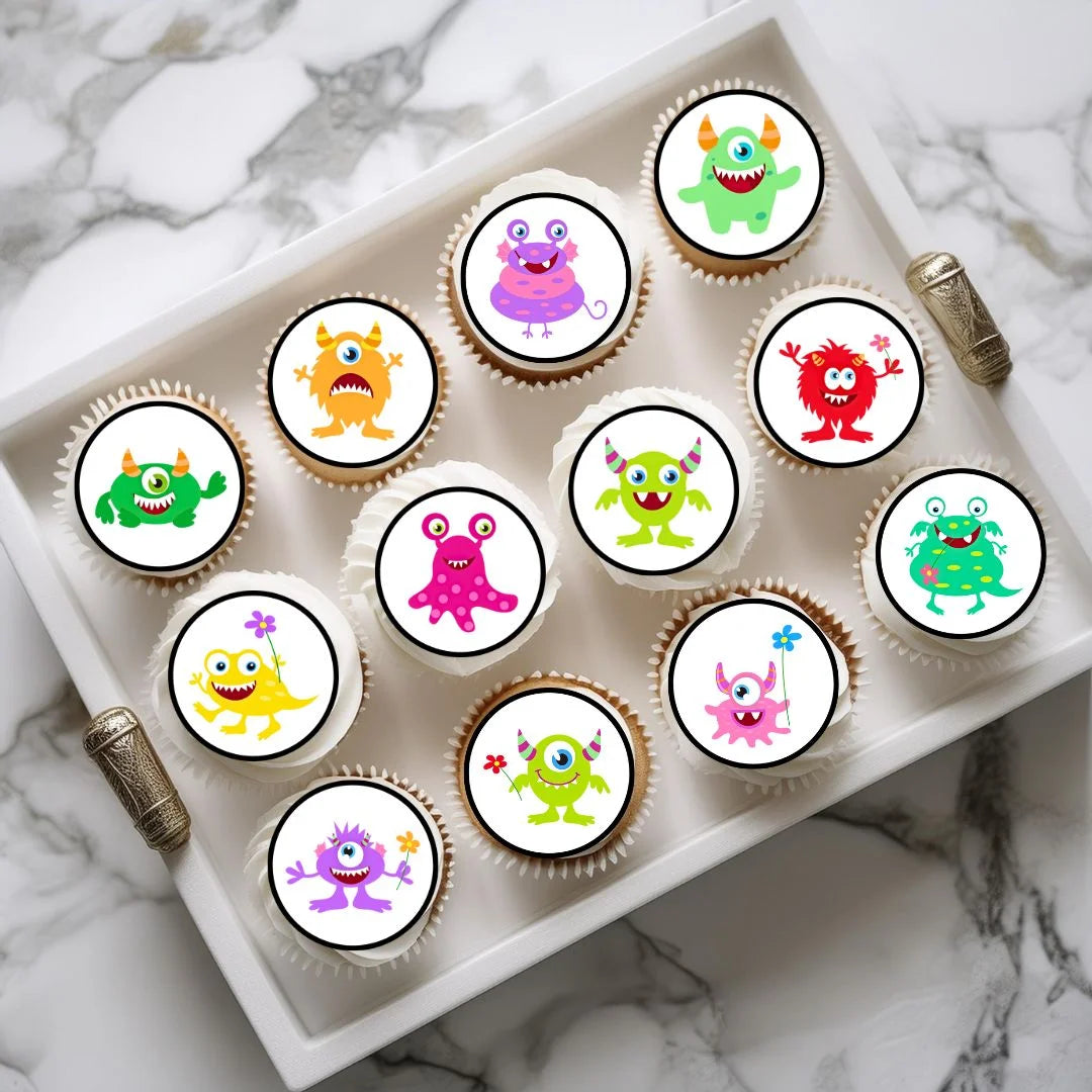 colourful Monsters Edible Cupcake Toppers on cupcakes with white frosting 