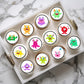 colourful Monsters Edible Cupcake Toppers on cupcakes with white frosting 