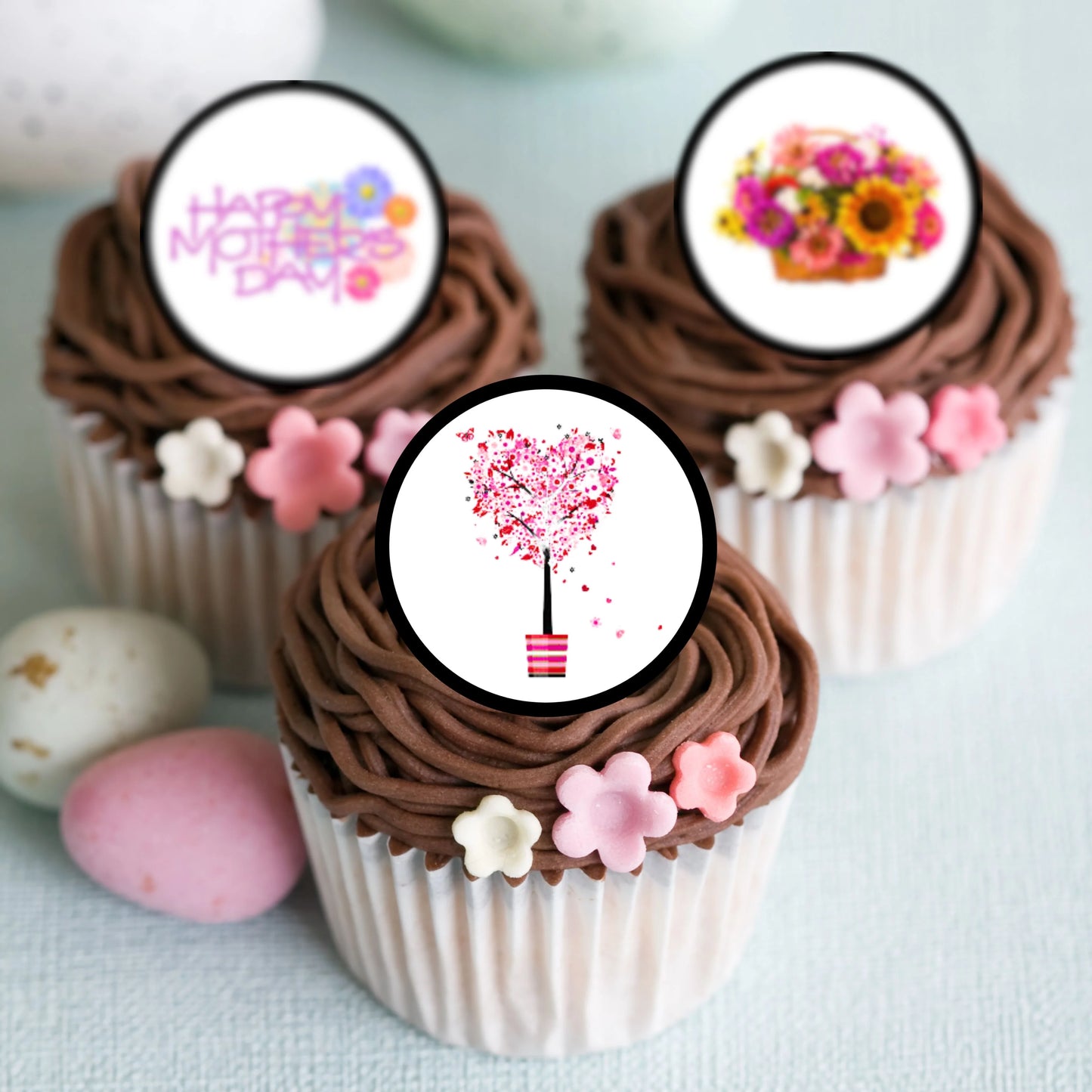 Mothers Day Floral Edible Cupcake Toppers on chocolate frosted cupcakes 