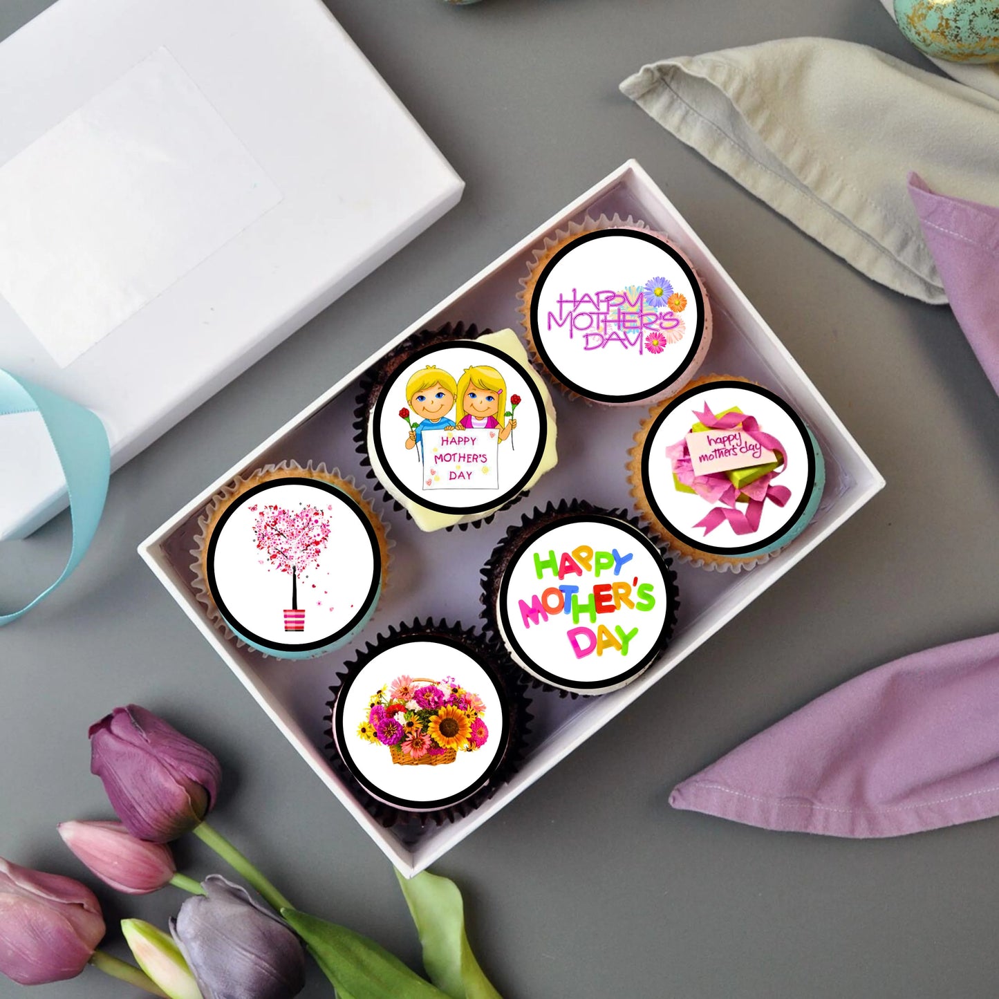 Mothers Day Floral Edible Cupcake Toppers on chocolate frosted cupcakes 