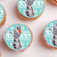 Frozen Olaf Edible Cupcake Toppers on white frosted cupcakes 