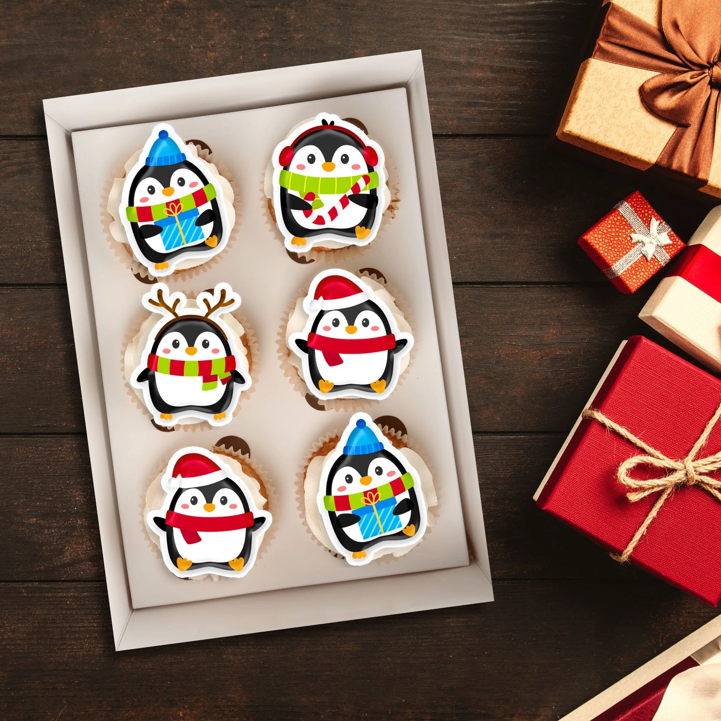 Cute Penguin Edible Cupcake Toppers on chocolate cupcakes with white frosting 