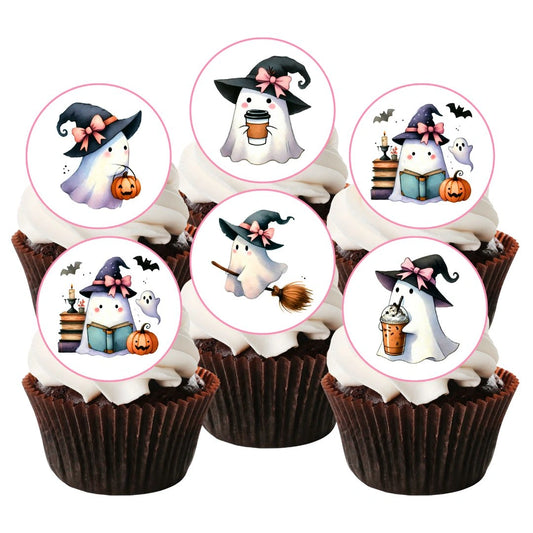 Coquette Ghost Edible Cupcake Toppers featuring a ghost wearing a witches hat. The toppers are on chocolate cupcakes with white frosting 