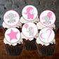 six Chocolate cupcakes with white frosting and Pink Elephant Baby Shower Cupcake Toppers