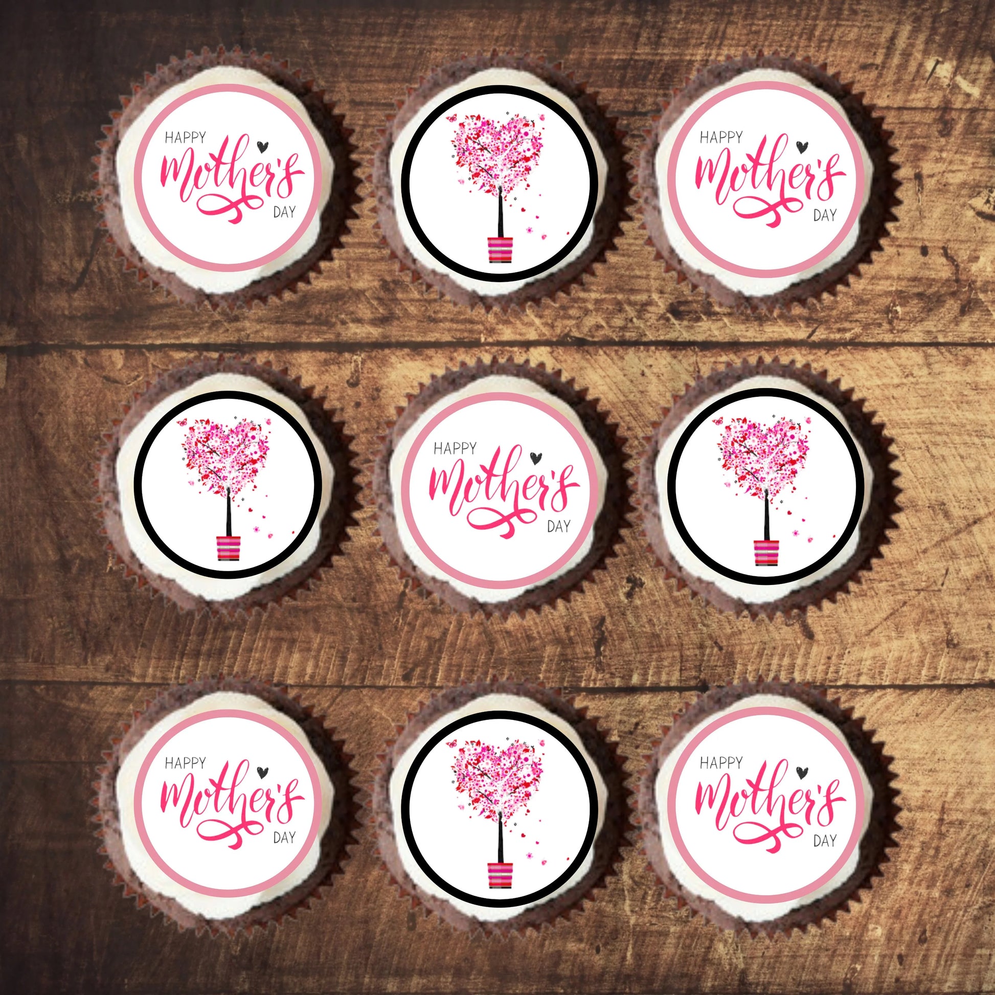 pink Mothers Day Edible Cupcake Toppers on white frosted cupcakes