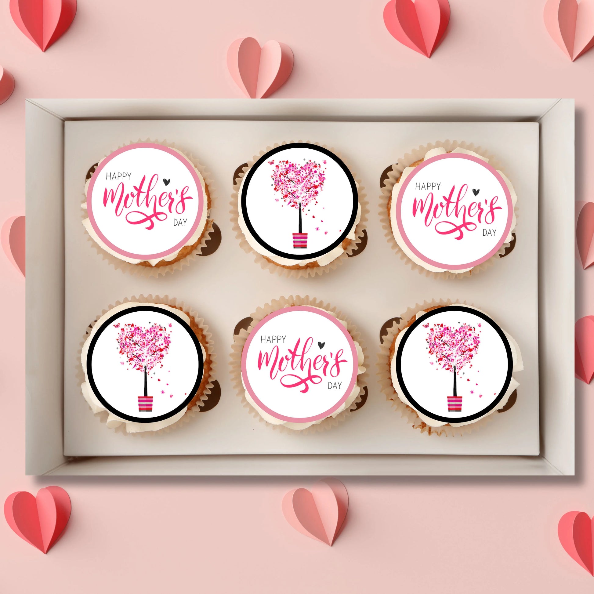 pink Mothers Day Edible Cupcake Toppers on white frosted cupcakes