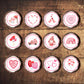 Pink Valentines Day Edible Cupcake Toppers on white frosted cupcakes 