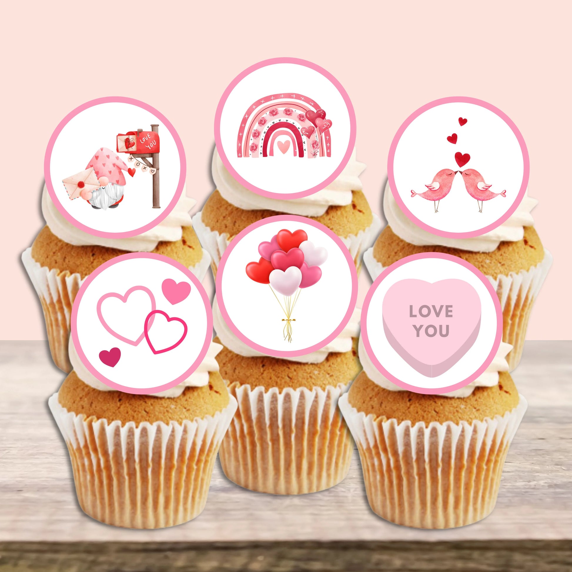 Pink Valentines Day Edible Cupcake Toppers on white frosted cupcakes 