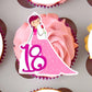 close up of a pink Princess Edible Cupcake Topper on top of pink frosted cupcake