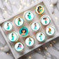 Princess Jasmine Theme Edible Cupcake Toppers on white frosted cupcakes 