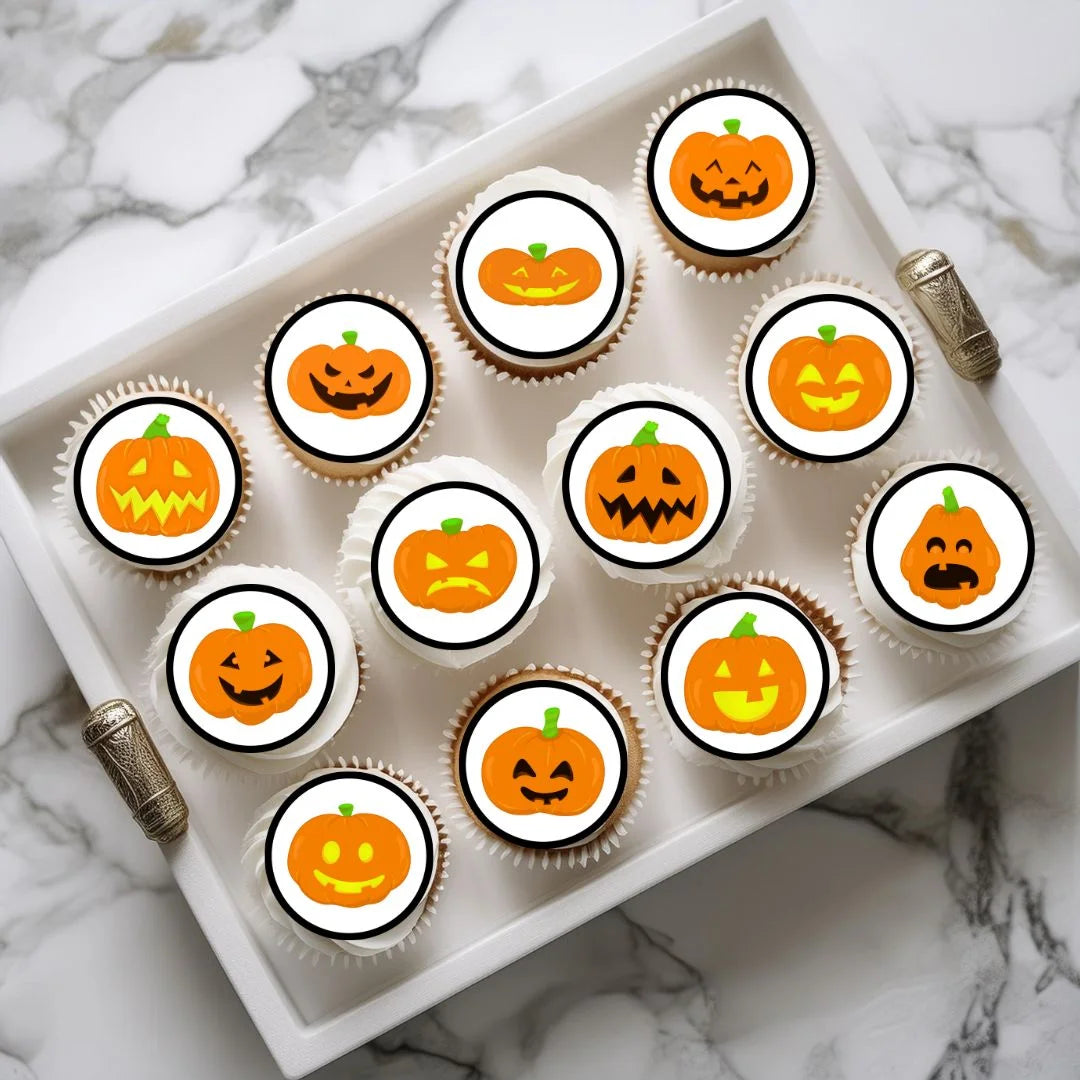 Halloween Pumpkins Edible Cupcake Toppers on chocolate cupcakes with white frosting 