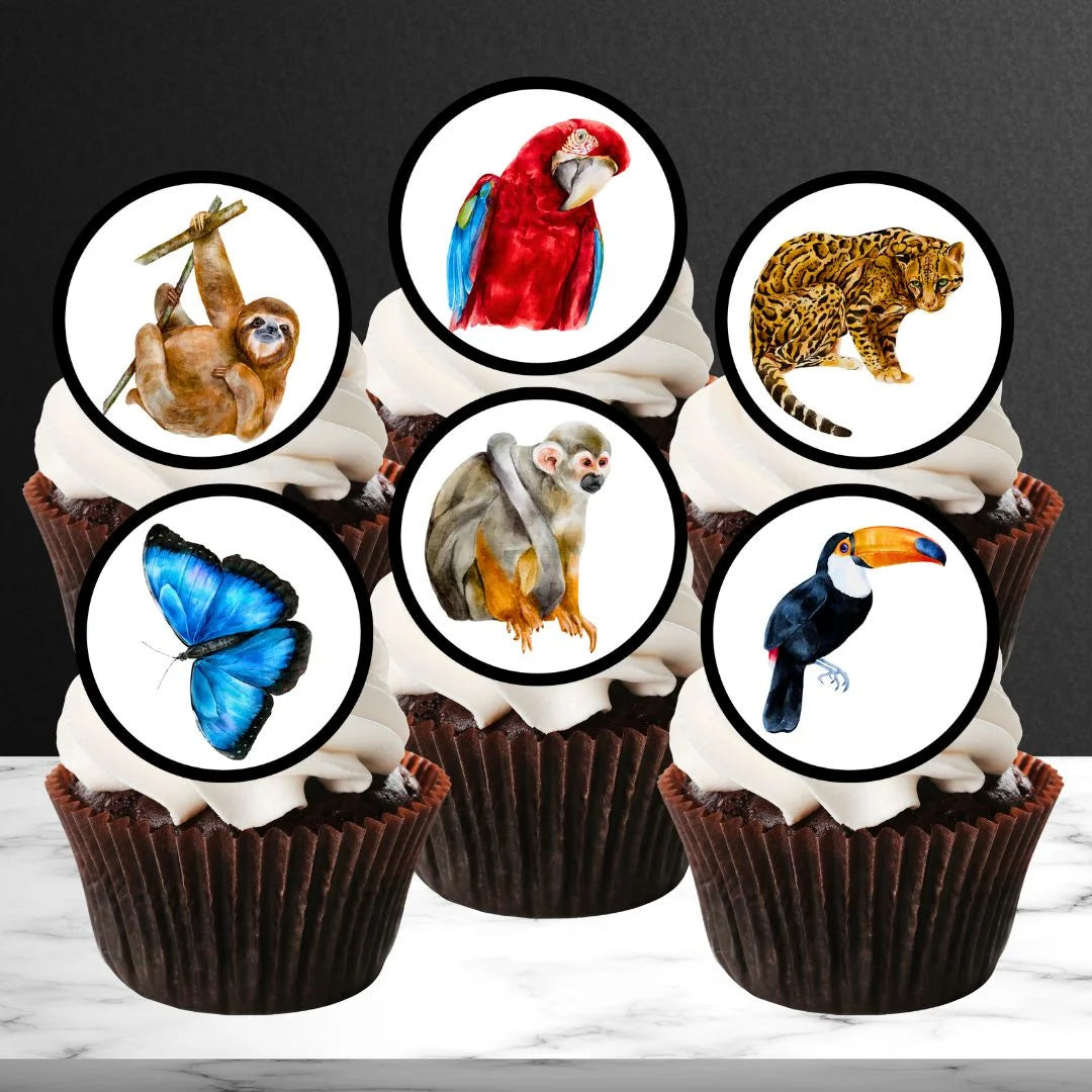 rainforest animals edible cupcake toppers on chocolate cupcakes with white frosting 