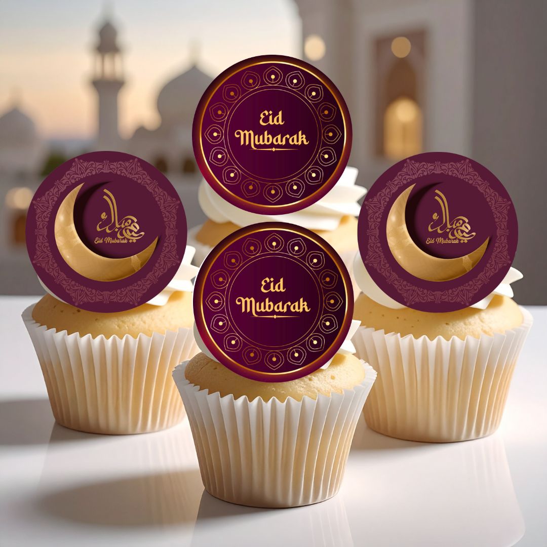 Cupcakes with Eid Mubarak toppers on a reflective surface with a blurred background