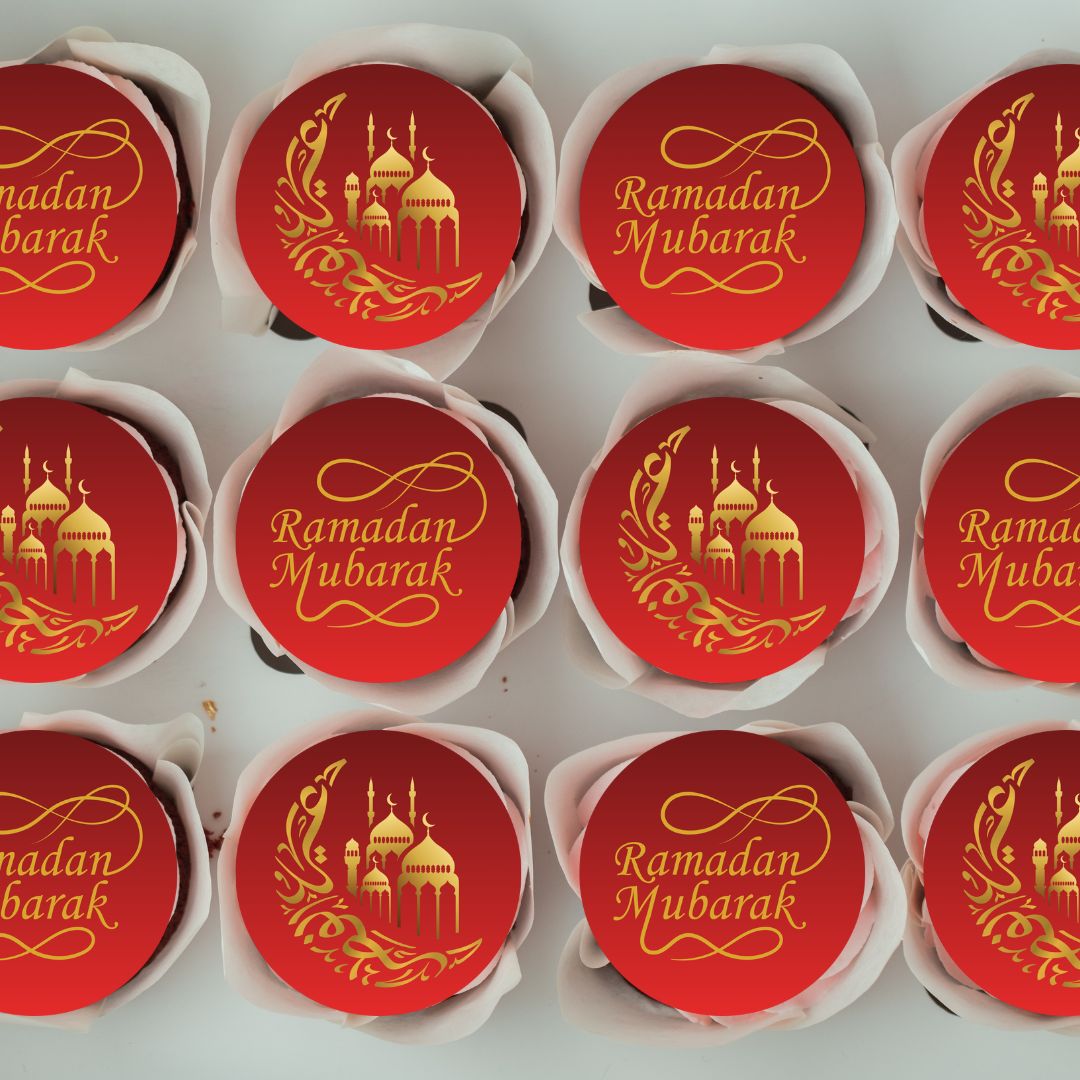 Red and gold 'Ramadan Mubarak' cookies arranged in a grid.