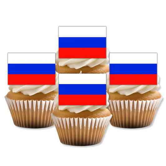 Russia Flag Edible Cupcake Toppers on four cupcakes with white frosting