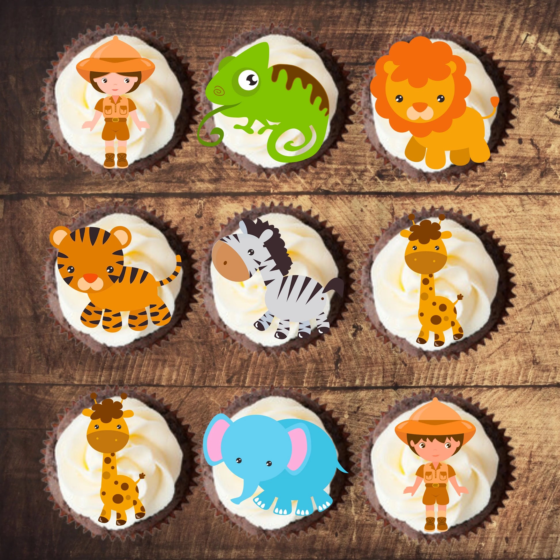 top down view of nine frosted cupcakes with safari animals cupcake toppers