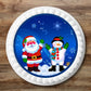 Christmas Santa Snowman Cupcake Toppers on white iced cake  