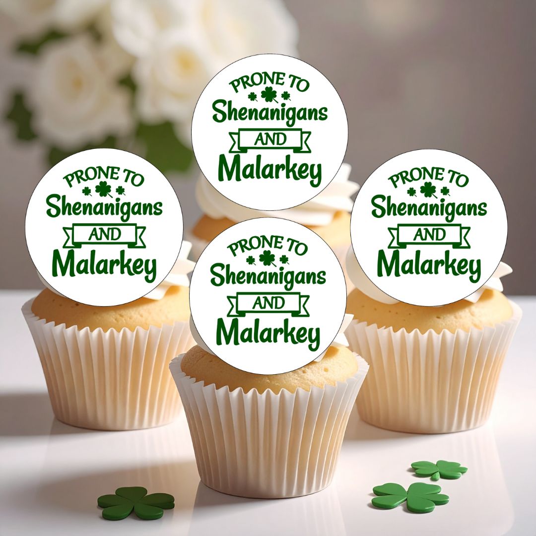 Cupcakes with 'Prone to Shenanigans and Malarkey' toppers on a white background.