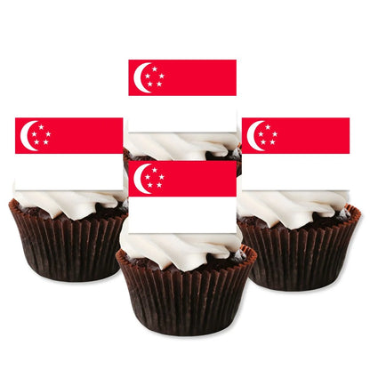 Singapore Flag Edible Cupcake Toppers on four white frosted cupcakes