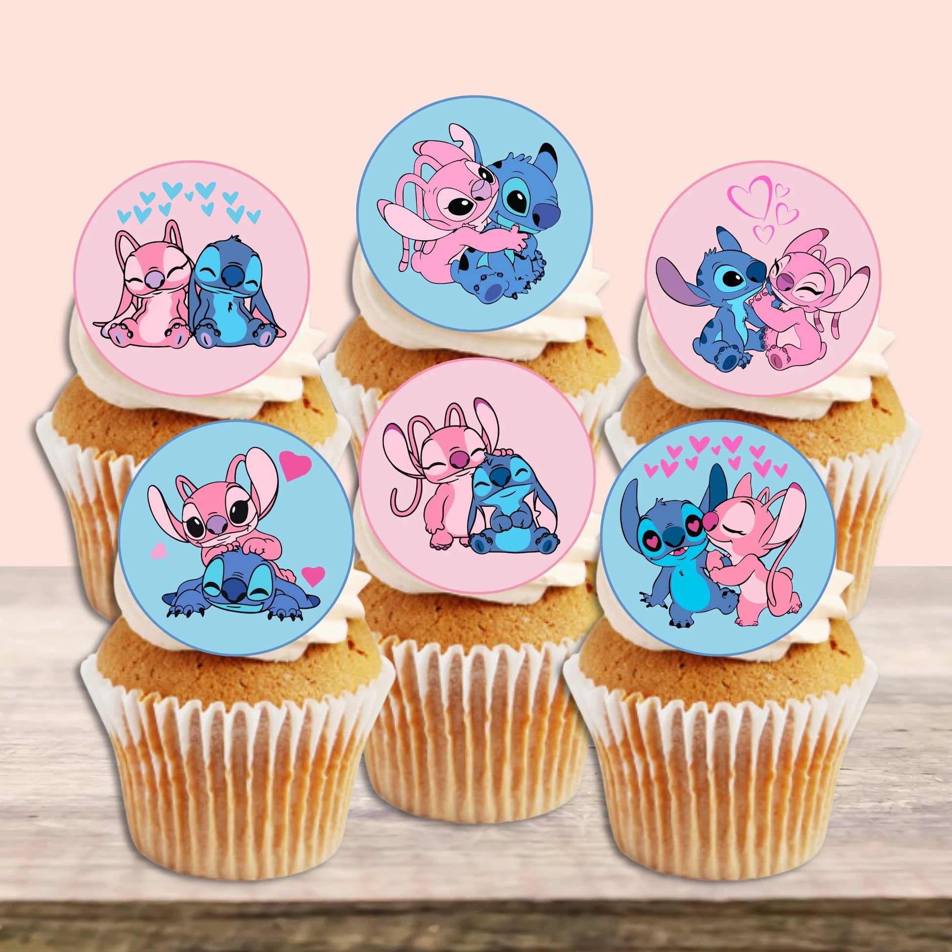 Stitch And Angel Themed Edible Cupcake Toppers on chocolate cupcakes with white frosting 