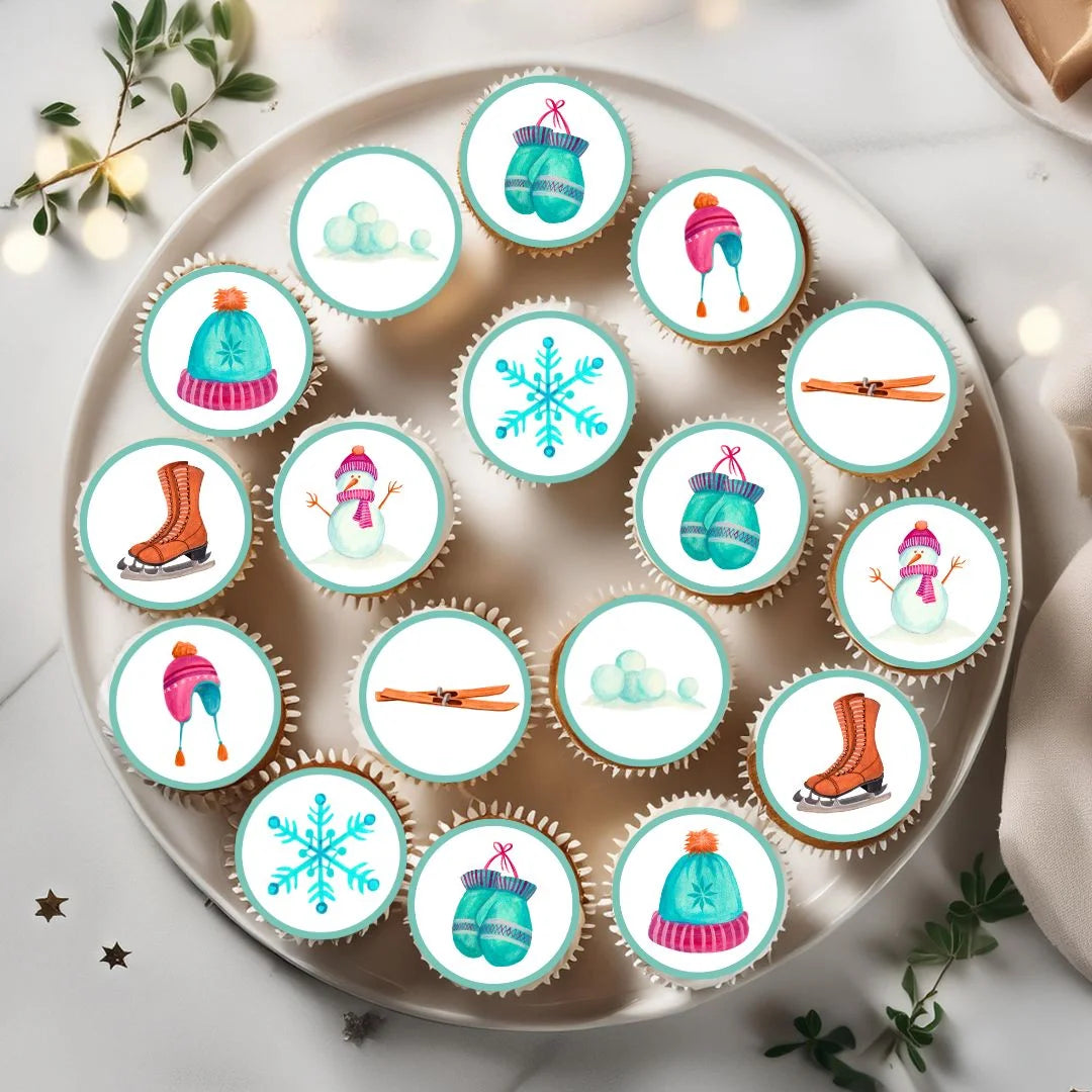 Ski Winter Theme Edible Cupcake Toppers on chocolate cupcakes with white frosting 