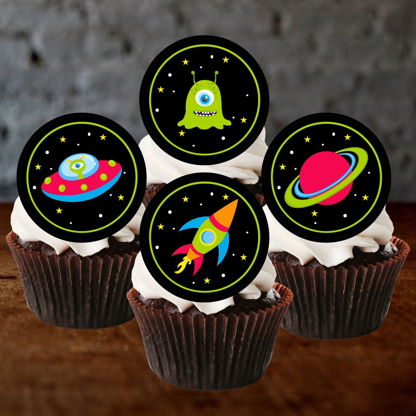 Space Theme Edible Cupcake Toppers on chocolate cupcakes toppers with white frosting 