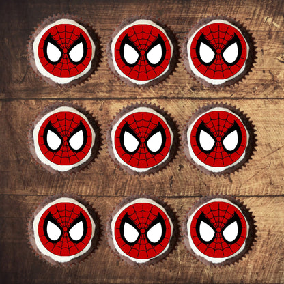 Spider-Man Face Edible Cupcake Toppers on chocolate cupcakes with white frosting 