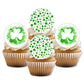 Cupcakes with white frosting and green shamrock decorations on a white background