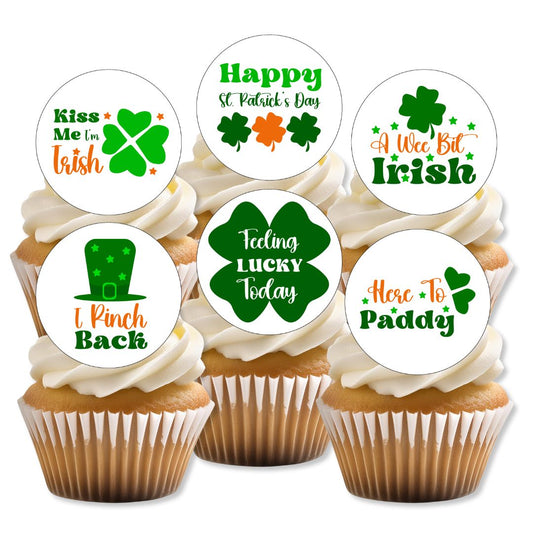 Cupcakes with St. Patrick's Day-themed toppers on a white background